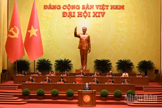 Tổng Bí thư Tô Lâm Báo cáo về các văn kiện trình Đại hội XIV Đảng Cộng sản Việt Nam tại phiên khai mạc Đại hội đại biểu toàn quốc lần thứ XIV Đảng Cộng sản Việt Nam. (Ảnh: TRẦN HẢI)