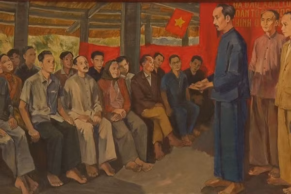 Chủ tịch Hồ Chí Minh nói chuyện với đại biểu Quốc dân Đại hội tại Đình Tân Trào. (Tranh sơn dầu: Họa sĩ Cao Thương)