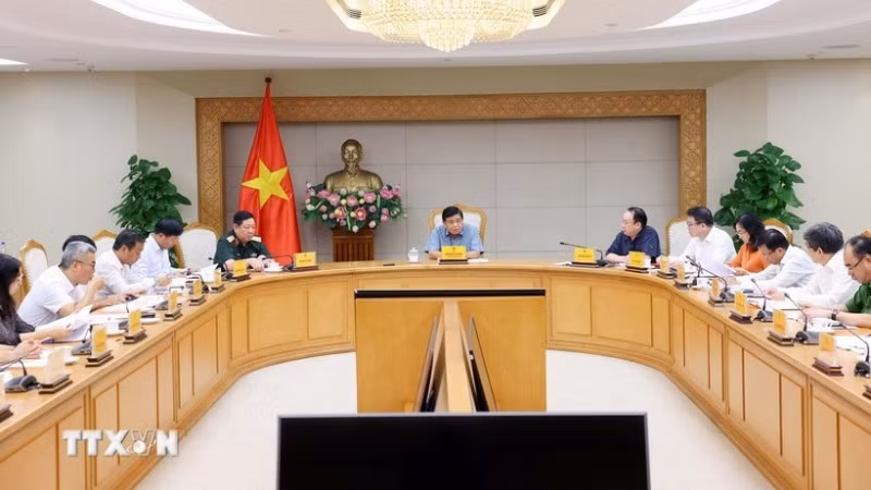 Quang cảnh cuộc họp về các dự án hợp tác Việt Nam-Lào. (Ảnh: PHẠM KIÊN/TTXVN)
