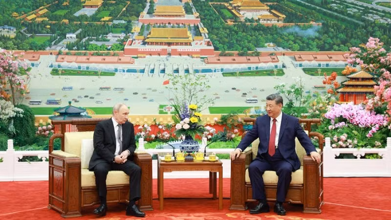 Chủ tịch Tập Cận Bình và Tổng thống Putin dự tiệc trà. (Ảnh: Tân Hoa xã)