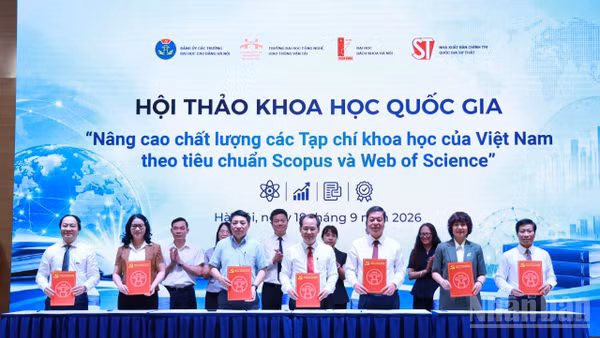 Lễ ký kết biên bản hợp tác giai đoạn 2026-2030 giữa 20 đơn vị thành viên, nhằm phối hợp, chia sẻ kinh nghiệm phát triển các tạp chí khoa học gia nhập danh mục Scopus và Web of Science. (Ảnh: Khánh Lan)