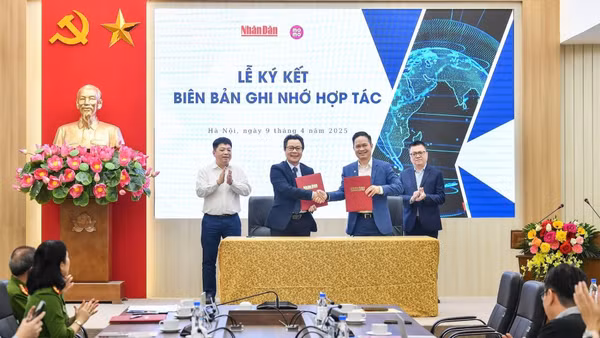 Báo Nhân Dân ký kết hợp tác với Cục Cảnh sát Quản lý hành chính về trật tự xã hội (C06) - Bộ Công an đưa các tin, bài, chuyên mục của Báo Nhân Dân lên ứng dụng VNeID. (Ảnh: Báo Nhân Dân)
