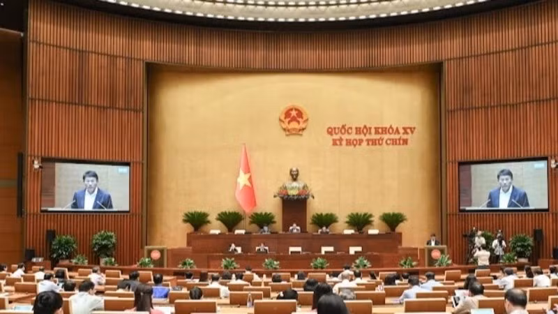 Quốc hội làm việc tại hội trường nghe Tờ trình và Báo cáo thẩm tra dự án Luật sửa đổi, bổ sung một số điều của Bộ luật Hình sự, ngày 20/5/2025. (Ảnh: BÙI GIANG)