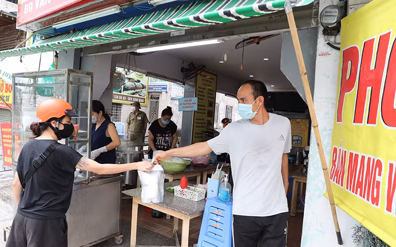 Từng bước chủ động quay về cuộc sống bình thường mới -0
