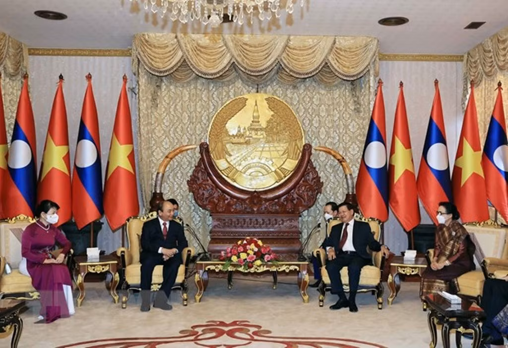 Tổng Bí thư, Chủ tịch nước Lào đón, hội đàm với Chủ tịch nước Nguyễn Xuân Phúc -0