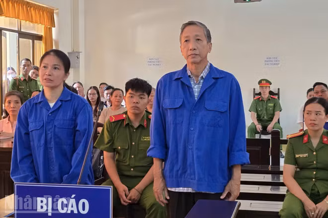 Bị cáo Lê Văn Mót và Nguyễn Thị Hằng. (Ảnh: QUỐC TRINH)