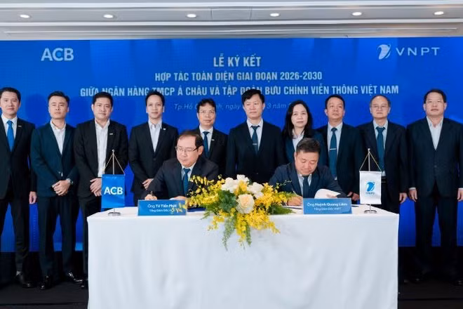Lãnh đạo ACB và VNPT thực hiện nghi thức ký kết thỏa thuận hợp tác toàn diện giai đoạn 2026-2030.