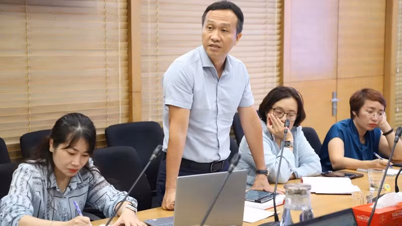 Các đại biểu trao đổi, thảo luận tại hội thảo.