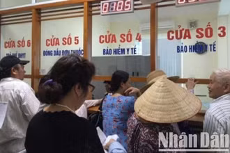 Quy định mới về đối tượng, mức đóng bảo hiểm y tế. (Ảnh: NHÂN DÂN)