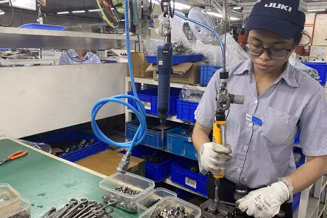 Sản xuất công nghiệp tại Khu chế xuất Tân Thuận. (Ảnh: VÕ LÊ)
