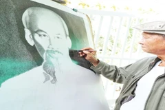 Sau nửa thế kỷ vẽ chân dung Bác Hồ, họa sĩ Võ Đồng Minh đã hoàn thành công trình lớn nhất của đời mình. (Ảnh ĐẠI DƯƠNG)