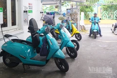 Mô hình quán cà-phê kết hợp trạm sạc xe điện nở rộ tại Thành Hồ Chí Minh thời gian gần đây.