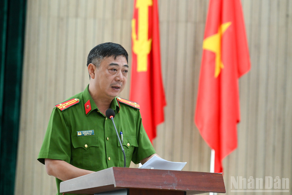 Thượng tá Phạm Đại Đồng, Phó Trưởng phòng Huấn luyện nghiệp vụ Cảnh sát cơ động báo cáo kết quả huấn luyện giai đoạn 1. ndo_br_so-ket-gd1-a80-6358.jpg