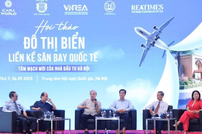 Các diễn giả trao đổi, thảo luận tại Hội thảo. (Ảnh: PV)