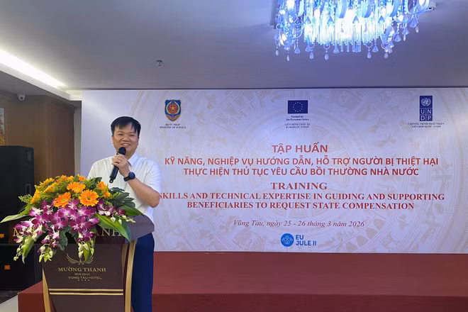 Ông Nguyễn Ngọc Vũ, Phó Cục trưởng Đăng ký giao dịch bảo đảm và Bồi thường nhà nước phát biểu tại hội nghị.