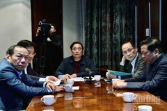 Thủ tướng Chính phủ Phạm Minh Chính chủ trì cuộc họp trực tuyến từ Nam Phi kết nối với các điểm cầu trong nước bàn giải pháp khắc phục hậu quả mưa lũ tại các tỉnh miền trung. (Ảnh: THANH GIANG)