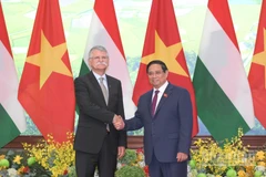 Thủ tướng Chính phủ Phạm Minh Chính và Chủ tịch Quốc hội Hungary Kover Laszlo. (Ảnh: TRẦN HẢI)