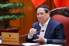 Thủ tướng Chính phủ Phạm Minh Chính chủ trì cuộc họp về điều hành kinh tế vĩ mô. (Ảnh: TRẦN HẢI) 