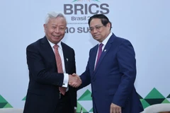 Thủ tướng Chính phủ Phạm Minh Chính tiếp Chủ tịch Ngân hàng Đầu tư Hạ tầng châu Á (AIIB) Kim Lập Quần. (Ảnh: VGP)