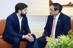 Thủ tướng Chính phủ Phạm Minh Chính gặp Tổng thống Chile Gabriel Boric Font. (Ảnh: VGP/NHẬT BẮC)