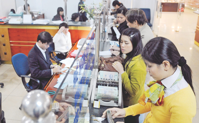 Hoạt động của các tổ chức tài chính - tín dụng thường khá "nhạy cảm" với các thông tin trên thị trường. Ảnh: NGUYỆT ANH