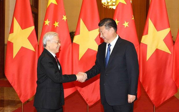 Tổng Bí thư, Chủ tịch nước Trung Quốc Tập Cận Bình đón Tổng Bí thư Nguyễn Phú Trọng trong chuyến thăm Trung Quốc hồi tháng 1/2017. (Ảnh: TTXVN)