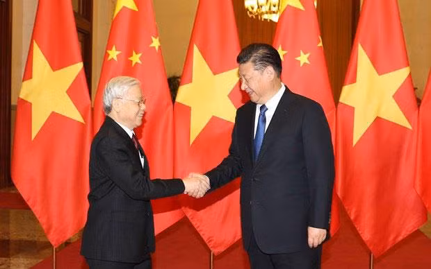 Tổng Bí thư, Chủ tịch nước Trung Quốc Tập Cận Bình đón Tổng Bí thư Nguyễn Phú Trọng trong chuyến thăm Trung Quốc hồi tháng 1/2017. (Ảnh: TTXVN)