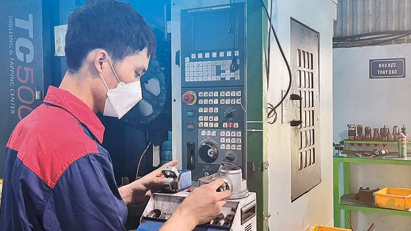 Hoạt động sản xuất tại Công ty cổ phần Thương mại và Phát triển Công nghệ PMA (huyện Hoài Đức, Hà Nội).