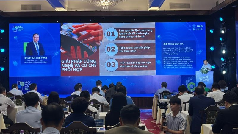 Quang cảnh Hội thảo “Nâng cao bảo mật, an toàn giao dịch không tiền mặt”. (Ảnh: ANH TUẤN)