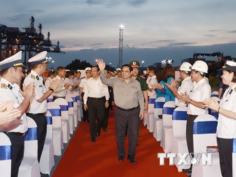 Thủ tướng Phạm Minh Chính dự Lễ phát lệnh làm hàng đầu năm của Tổng Công ty Tân Cảng Sài Gòn. (Ảnh: TTXVN)