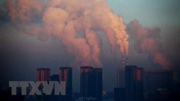 Khí thải tại nhà máy nhiệt điện ở Trường Xuân, tỉnh Cát Lâm, Trung Quốc. (Ảnh: AFP/TTXVN)