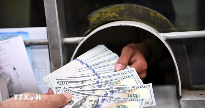 Giao dịch đồng USD. (Ảnh: THX/TTXVN)