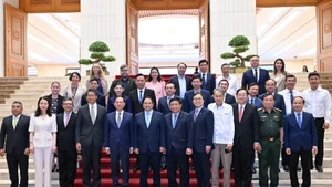 Thủ tướng Phạm Minh Chính và các đại biểu tham dự Lễ công bố thành lập Ủy ban Quốc gia APEC 2027.