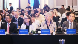 Các đại biểu dự Lễ công bố Báo cáo Kinh tế Việt Nam 2025.
