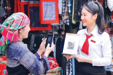 Agribank nỗ lực chuyển đổi số nhằm góp phần đẩy mạnh thanh toán không dùng tiền mặt và thực hiện Chiến lược tài chính toàn diện quốc gia. (Ảnh: HƯƠNG ANH)