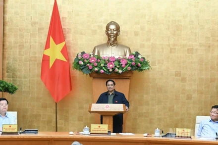 Thủ tướng Chính phủ Phạm Minh Chính chủ trì cuộc họp về đánh giá tình hình thực hiện mô hình chính quyền địa phương 2 cấp. (Ảnh: TRẦN HẢI)