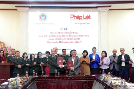 Quang cảnh buổi lễ ký kết và công bố Thể lệ Cuộc thi "Chuyện nghề thi hành án dân sự" lần thứ 2.(Ảnh: TL)