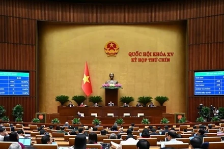 Quốc hội biểu quyết thông qua Bộ luật Tố tụng hình sự. (Ảnh: DUY LINH)