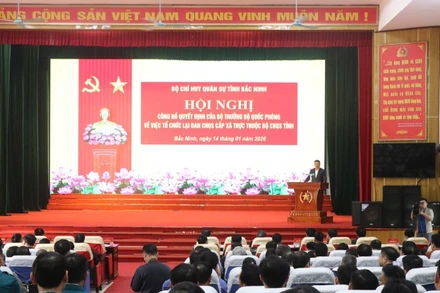 Quang cảnh hội nghị công bố quyết định của Bộ trưởng Bộ Quốc phòng về tổ chức lại Ban Chỉ huy Quân sự cấp xã tại tỉnh Bắc Ninh.