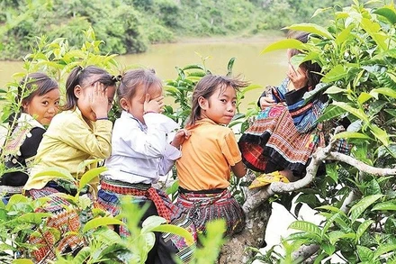 Nụ cười trẻ em miền núi. (Ảnh: ĐĂNG KHOA, BÁO NHÂN DÂN)