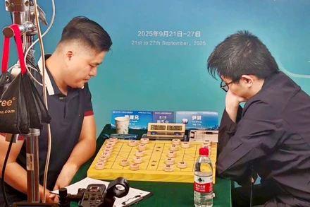 Lại Lý Huynh trong trận chung kết nội dung cờ tiêu chuẩn nam tại Giải cờ tướng thế giới. Ảnh | TLKĐ