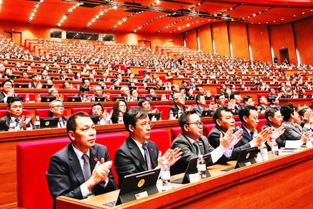 Các đại biểu đến dự Đại hội Đảng toàn quốc lần thứ XIV. (Ảnh HẢI LINH)