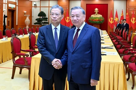 Tổng Bí thư Tô Lâm và Ủy viên trưởng Nhân đại toàn quốc Trung Quốc Triệu Lạc Tế. 