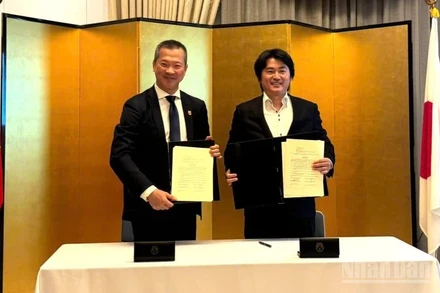 Ký kết ghi nhớ chính thức hợp tác giữa Tổ chức Guardian Girls International (GGI), Liên đoàn Vovinam Thế giới (WVVF) tối 16/9 tại Hà Nội. (Ảnh: HNV)