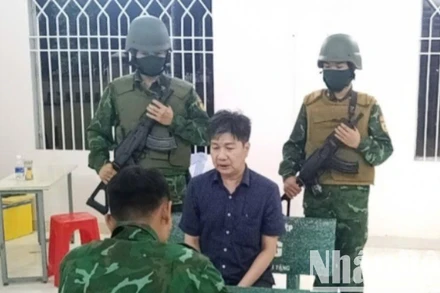 Phạm Mạnh Tân bị lực lượng chức năng bắt giữ.