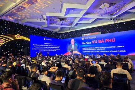 Hội nghị "Bứt phá xuất khẩu: Thương hiệu Việt cất cánh toàn cầu". (Ảnh: KIM DUNG)