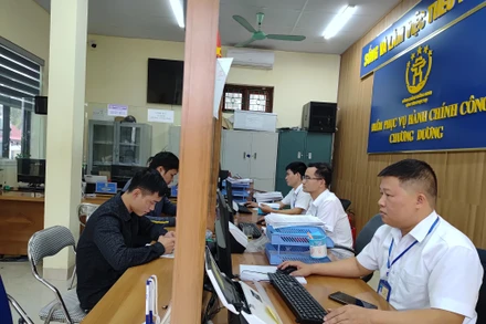 Cơ quan chức năng tích cực cải cách hành chính, phục vụ nhân dân. (Ảnh: VĂN HỌC)