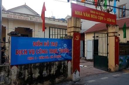 Điểm hỗ trợ Dịch vụ công trực tuyến đặt tại Nhà Văn hóa Cụm 1, Liên Hà, xã Ô Diên, Hà Nội. 
