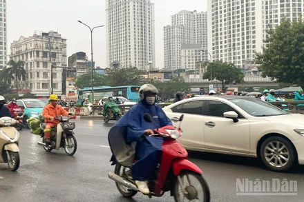 Hà Nội ngày có mưa vài nơi, sáng sớm có sương mù và sương mù nhẹ rải rác. (Ảnh minh họa: Đ.T)