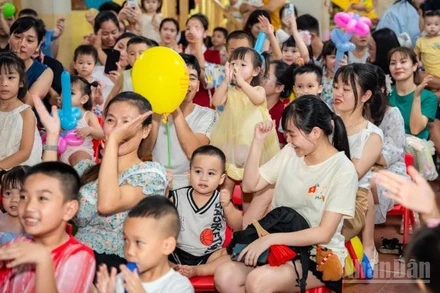 Nụ cười trẻ thơ. (Ảnh: HNV)